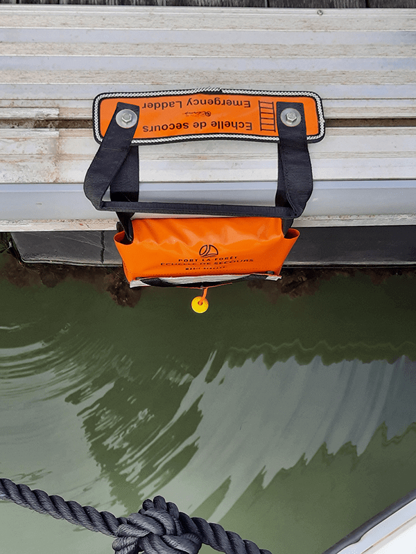 Dock Reboarding Emergency Ladder For Docks - Marinas - Boats attached to dock with water in background