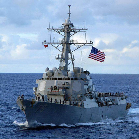 Coast Guard The Navy & Dolphins to the Rescue, U.S. Navy destroyer sailing in the ocean.