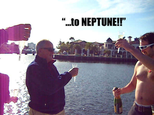Celebrating with drinks while renaming a boat, focusing on how to rename your boat.