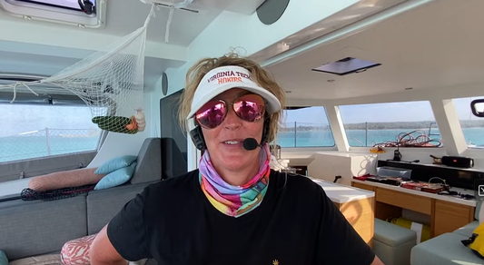 Crew member using a 2Talk Bluetooth boat intercom headset