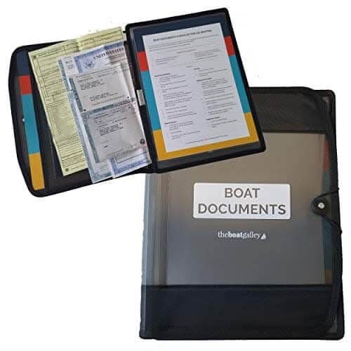 Water-resistant Boat Documents Organizer open with marine paperwork and closed gray document binder for onboard storage.
