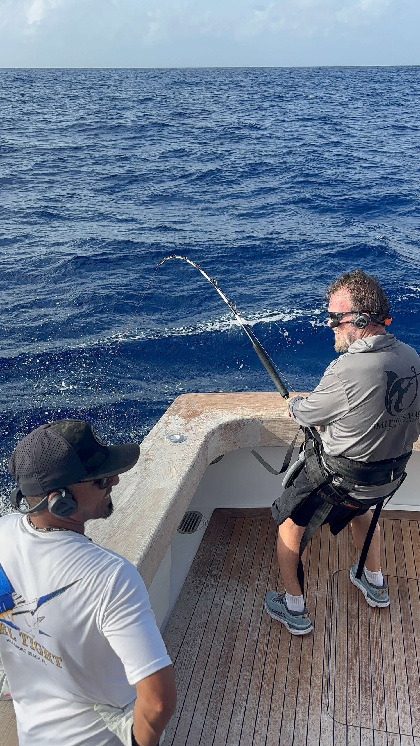 NAUTITALK BOSUN Waterproof Floating Headset DUAL PACK being used by fishermen onboard a boat.