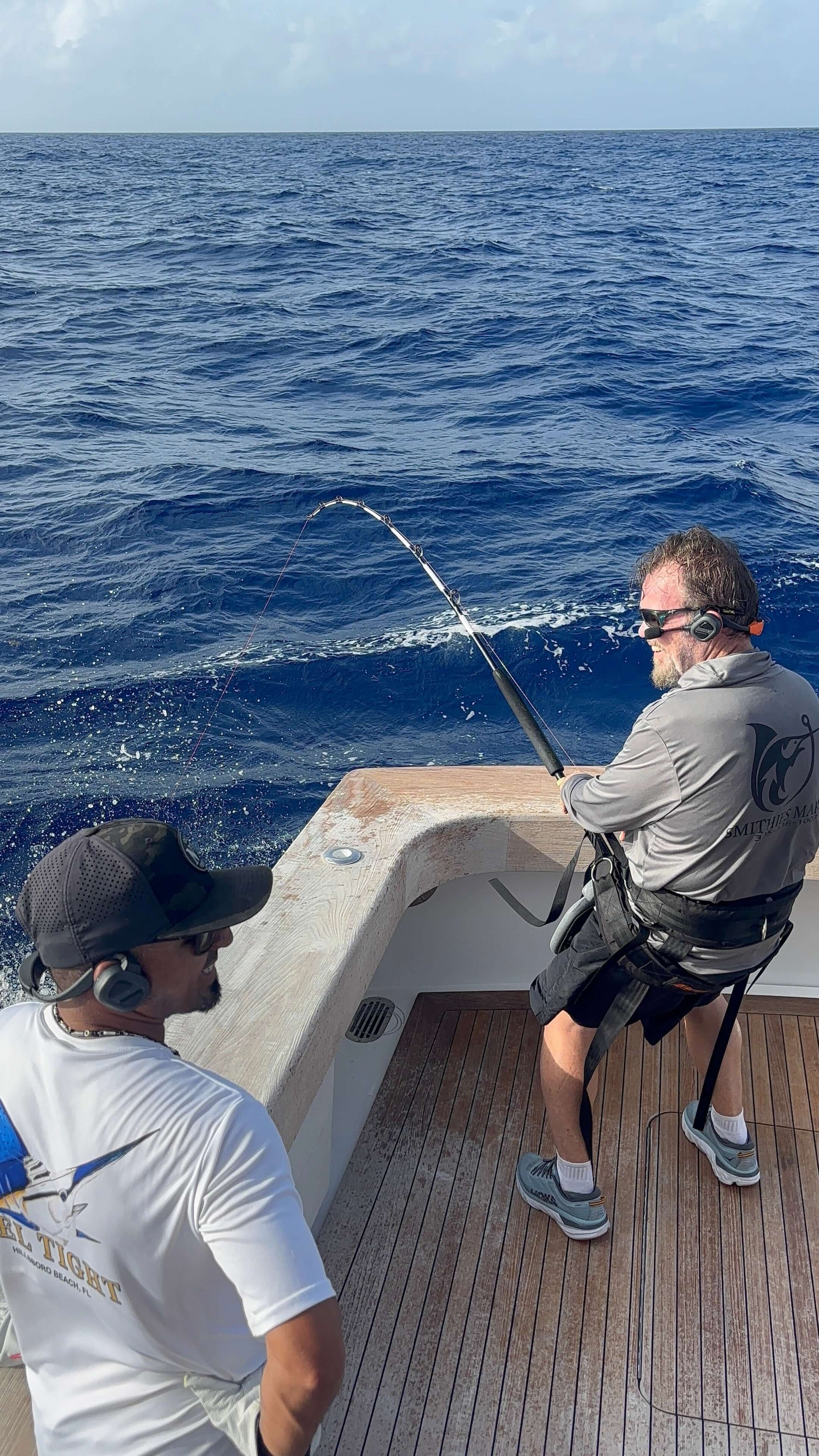 NAUTITALK BOSUN Waterproof Floating Headset DUAL PACK being used by fishermen onboard a boat.